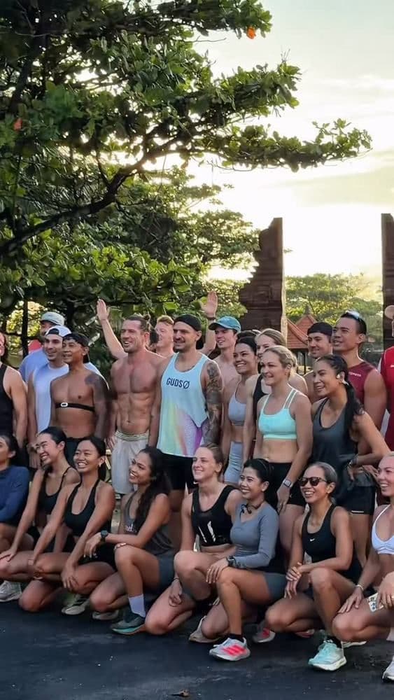 Run club group photo at sunrise
