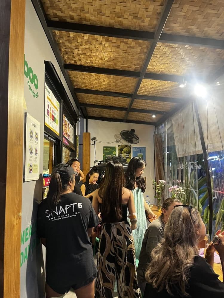 Guests queuing at the counter on opening night