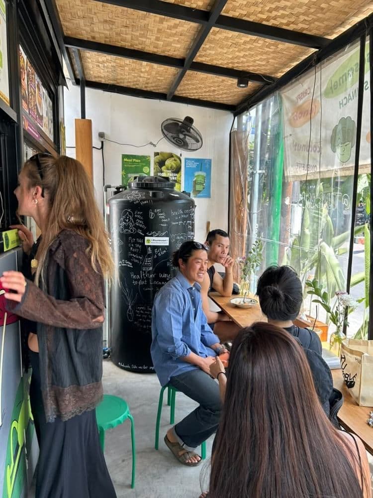 Busy store interior with chalkboard wall